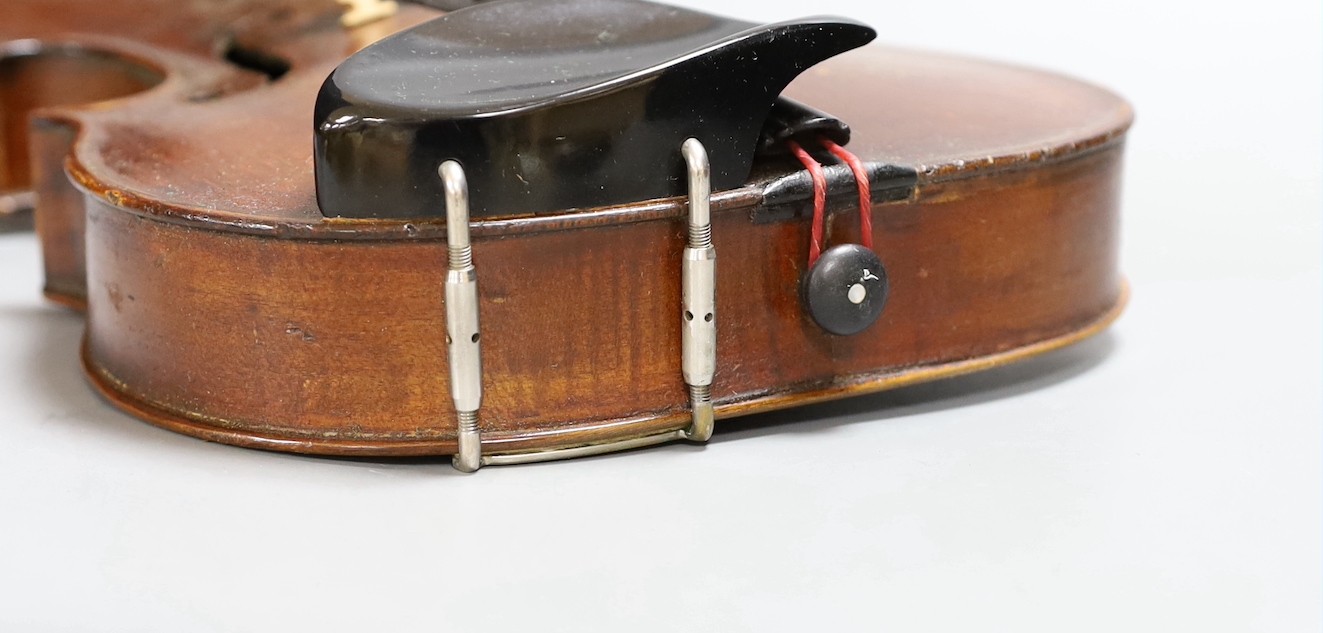 A cased late 19th century English violin, inscribed W. Heaton maker 1887 (?), back measures 35.5cm excl button